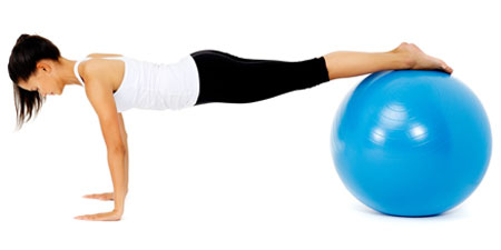 female physical therapy patient doing strength and balance exercies 